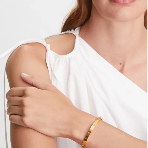 TORY BURCH • Gold 7mm Logo Miller Studded Hinge Bangle Bracelet - Picture 2 of 5